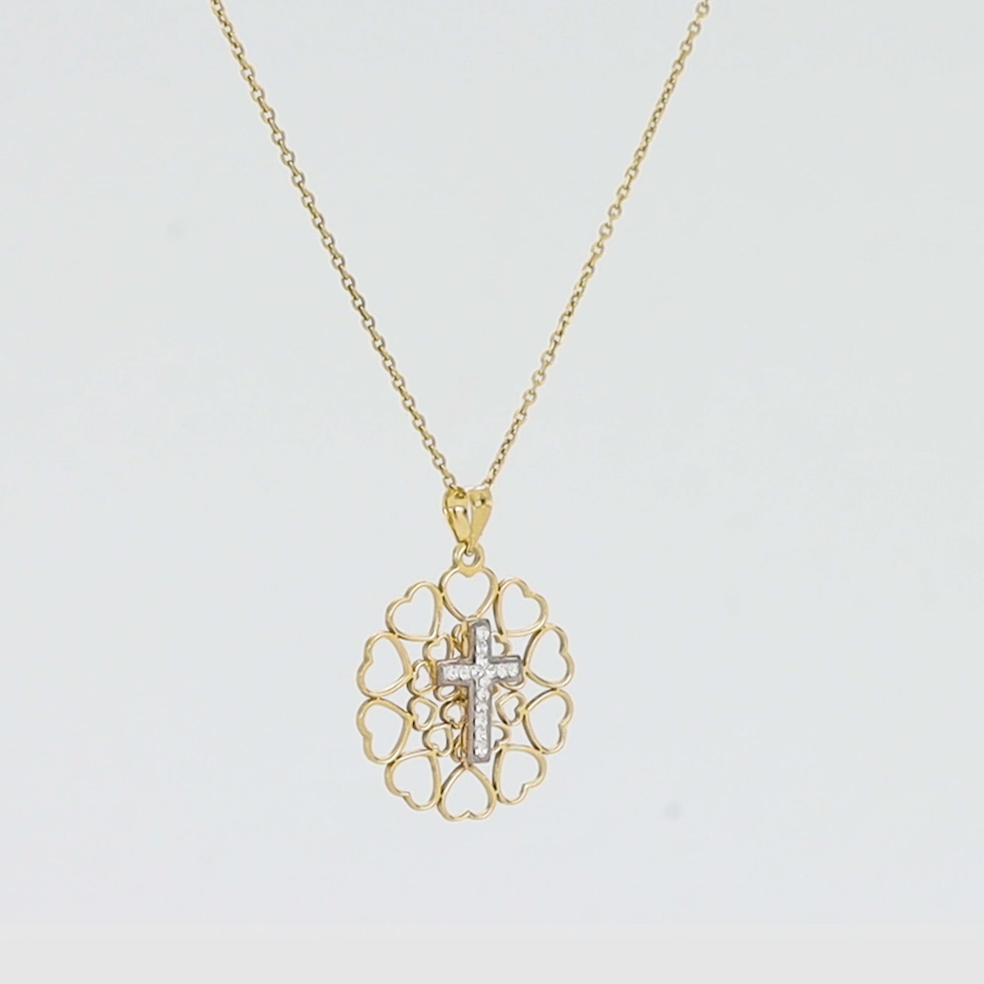 El colgante de cruz de cristal del amor